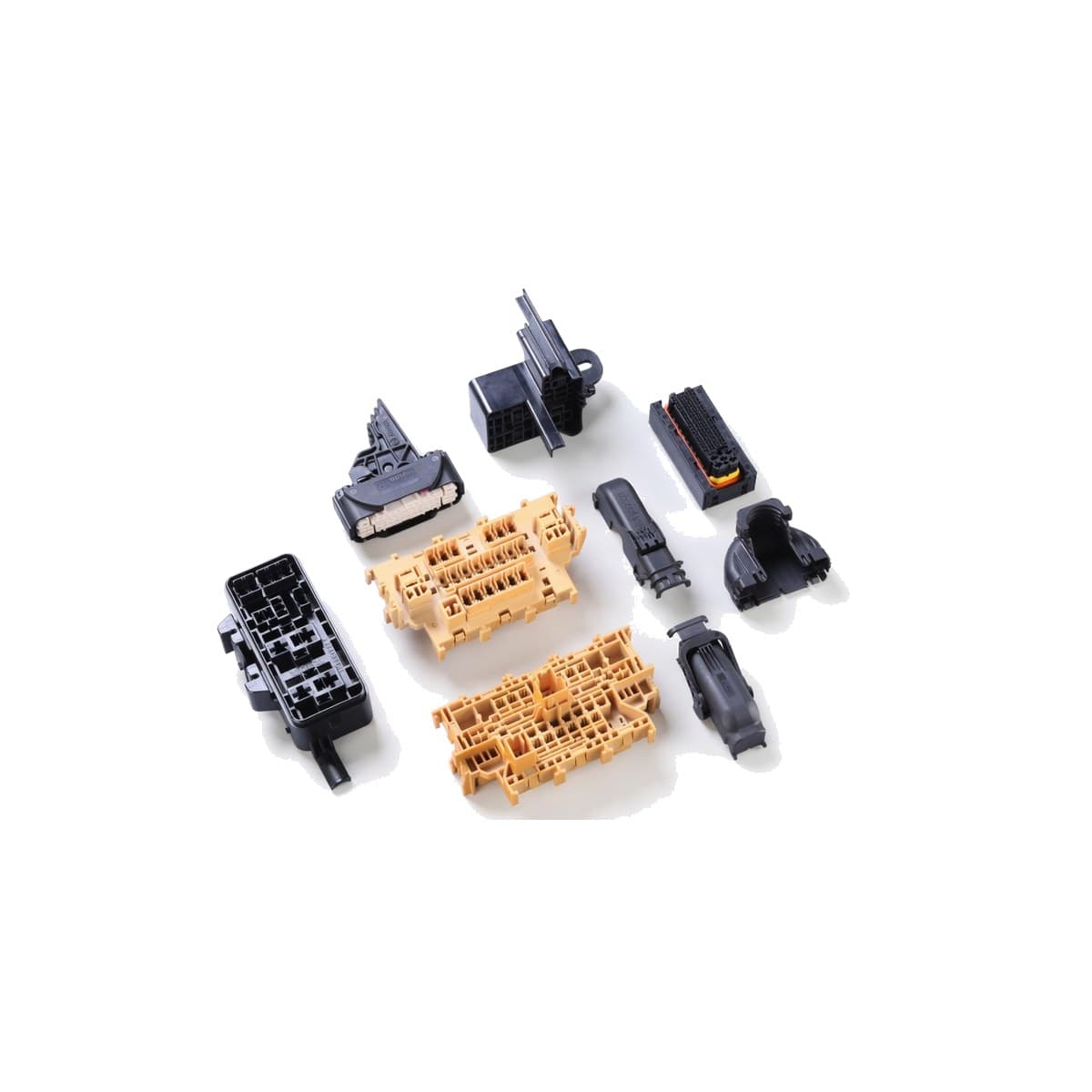 Molded connectors, fuse boxes, and cable housings
